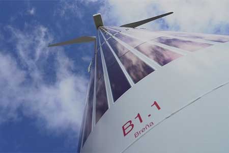 Органические солнечные панели установлены на башне ветряной турбины
